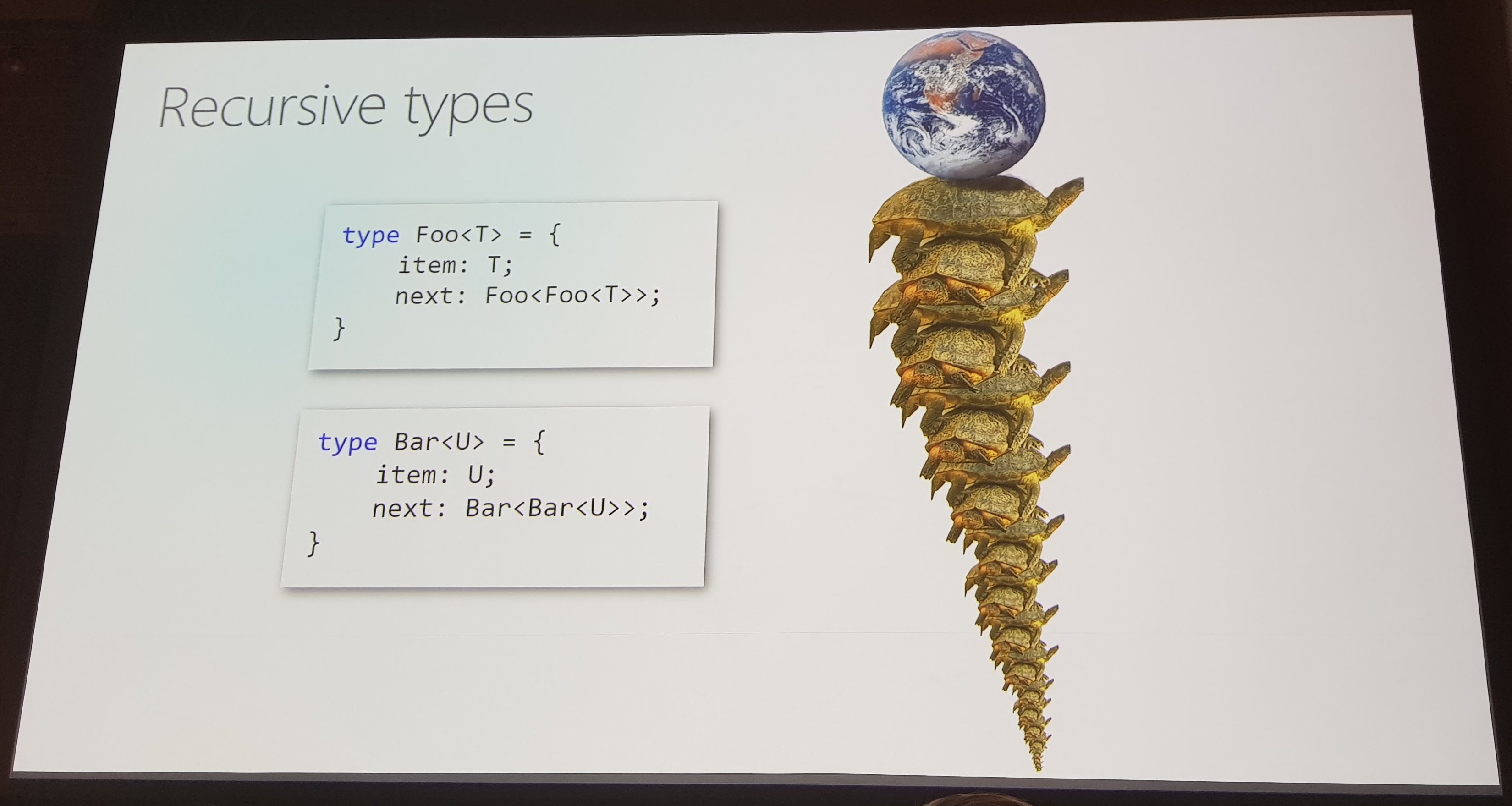 Slide equating recursive types to an infinite stack of turtles supporting the Earth